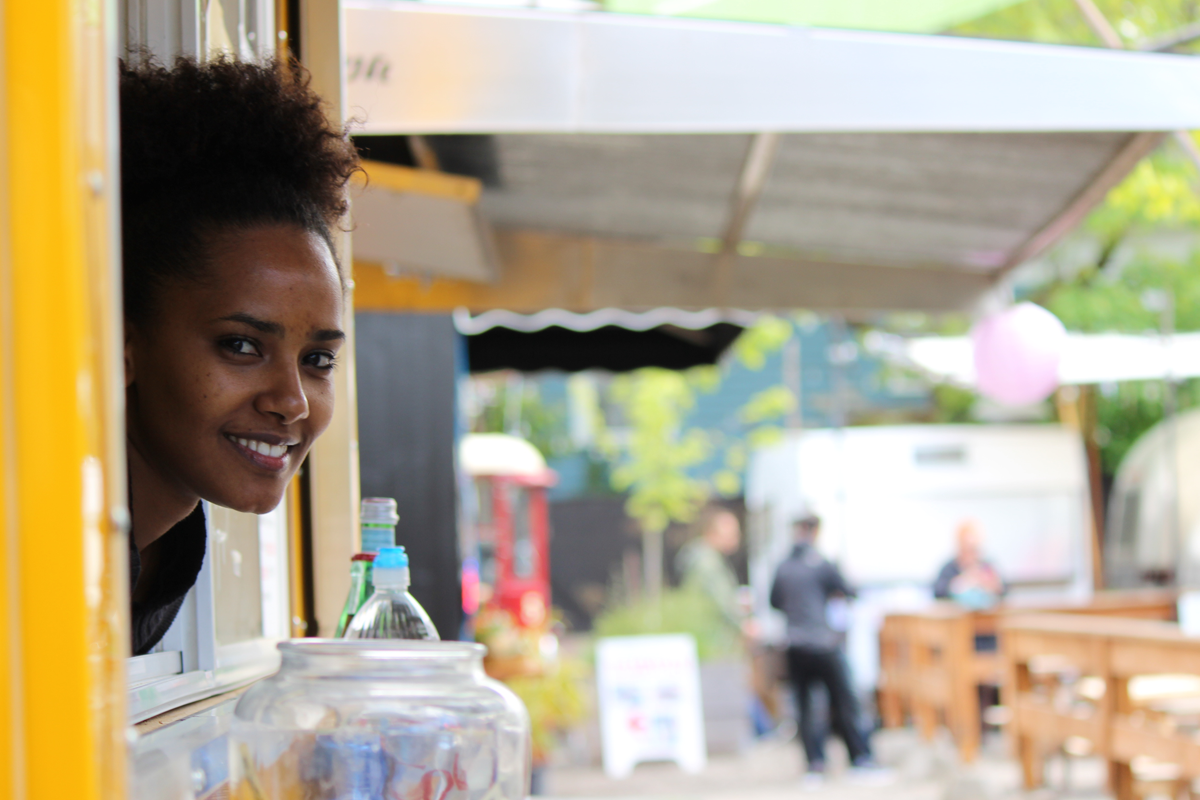 A business owner watched through her busuness' window in Portland, OR