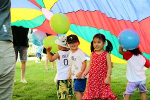 Kids playing with balloon