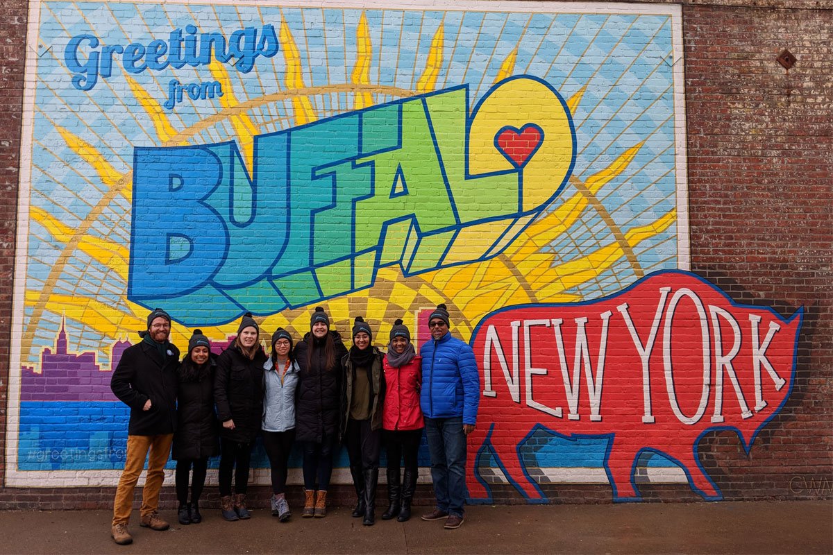 Wintermission team in front of mural in Buffalo, NY