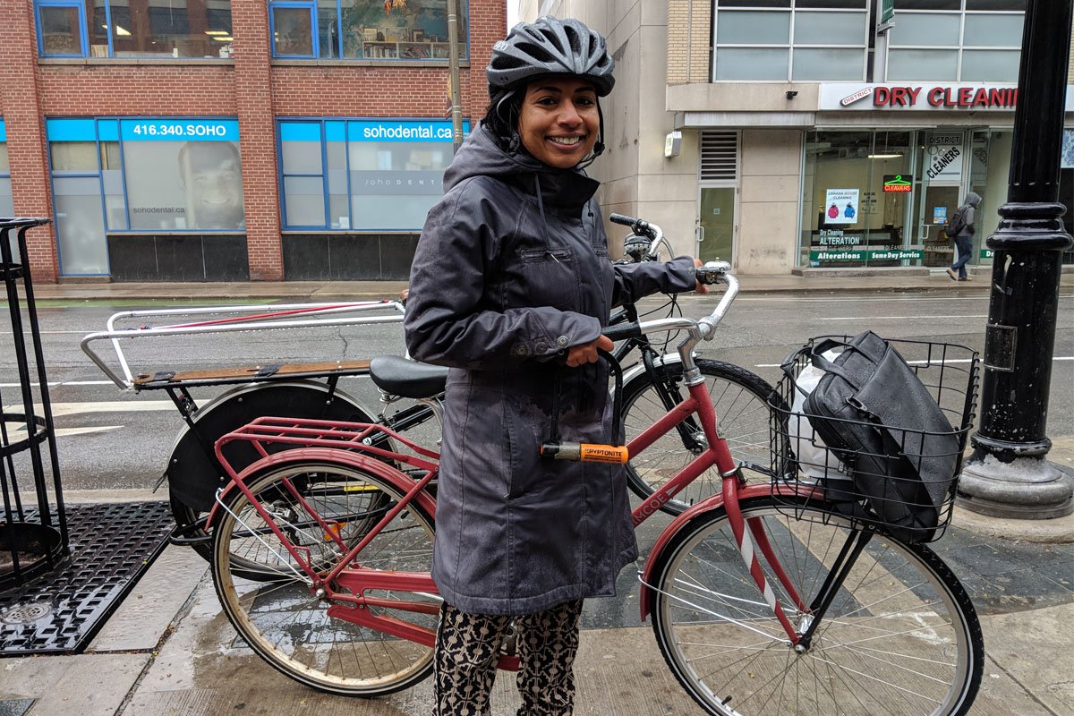 Woman getting to work by bike.