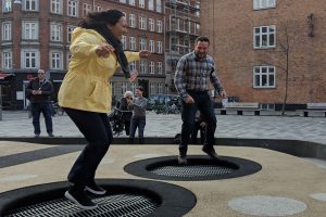 Camille Fontanilla jumping on a street trampoline in Copenhagen