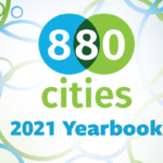 2021 Year Book cover page with the 8 80 Cities logo and a few green and blue circles.