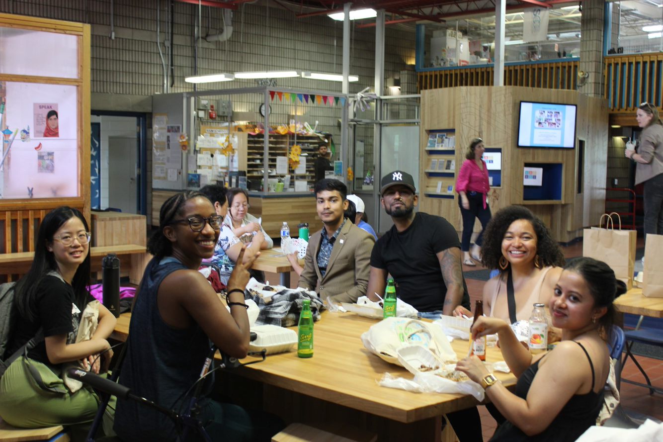 Changemakers take a break before the tour at Scadding Court Community Centre.